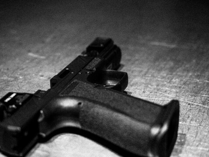eliezer-muller-Sj0N9-Bb_iM-unsplash gun, murder