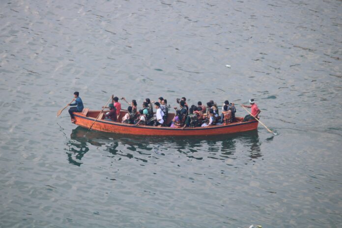 Migranti, foto manoj-poosam-unsplash